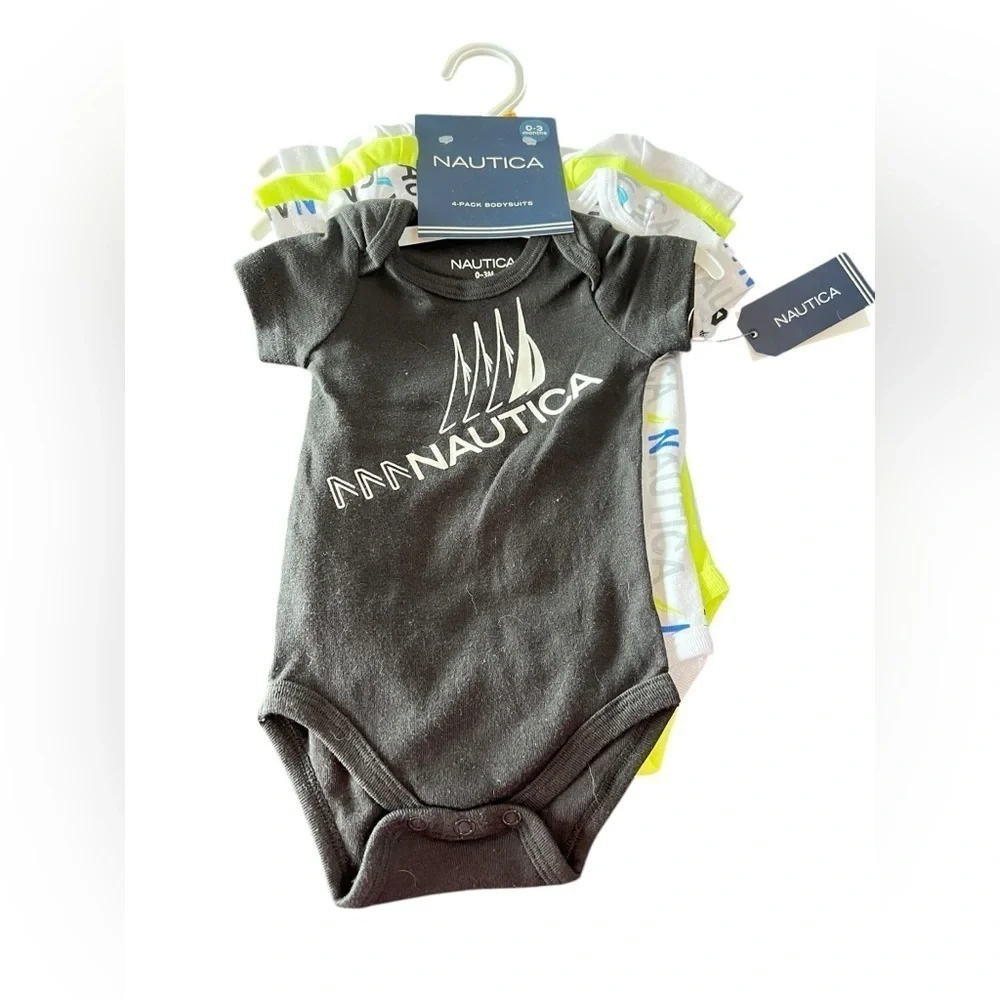 NWT Nautica Baby Boy Set of 4 onesies in size 0 to 3 months
